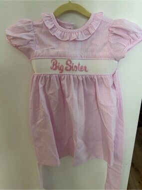 Remember Nguyen big sister smock size 2T worn once!